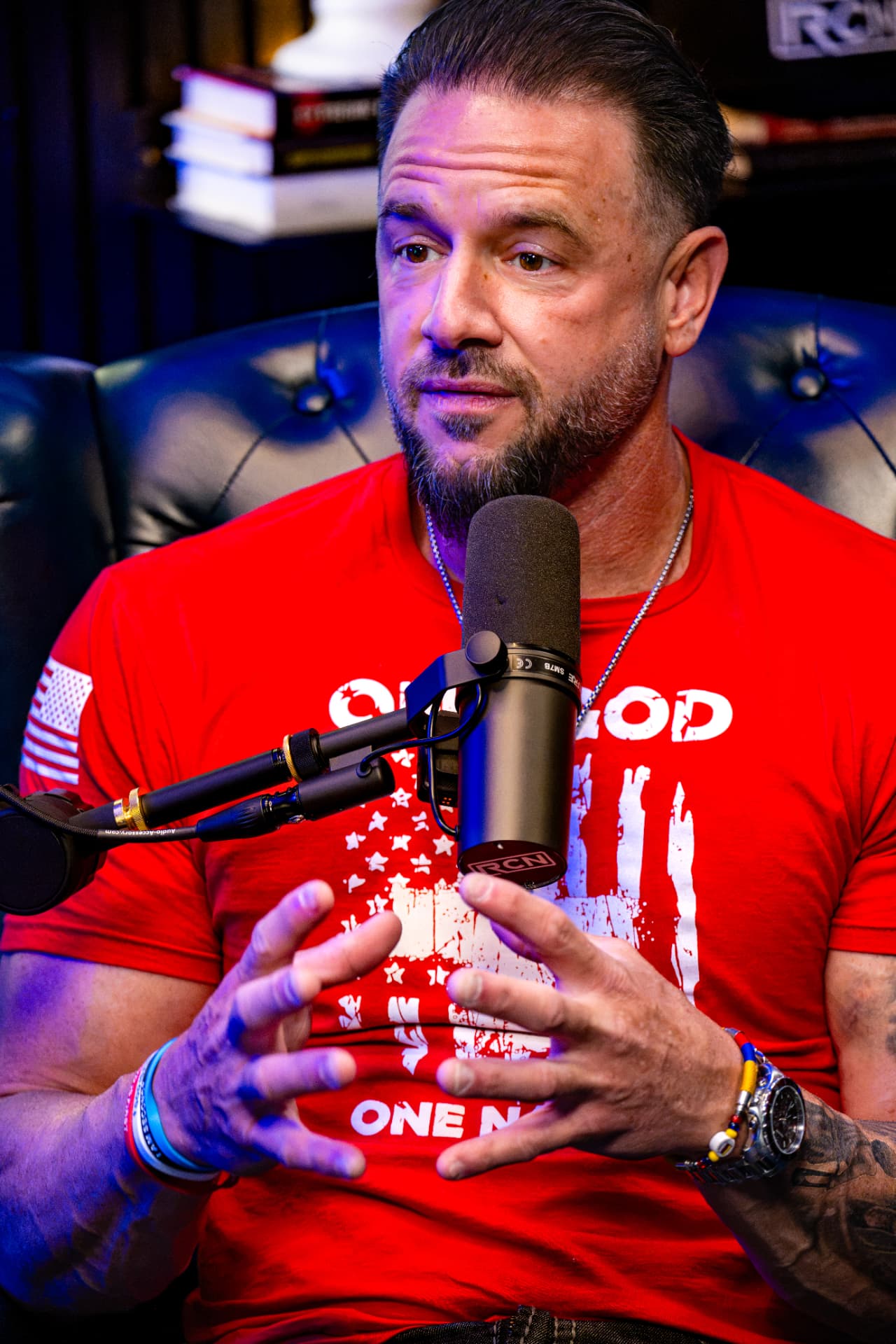 John Kundly speaking into the microphone on The Matthew Byrd Podcast
