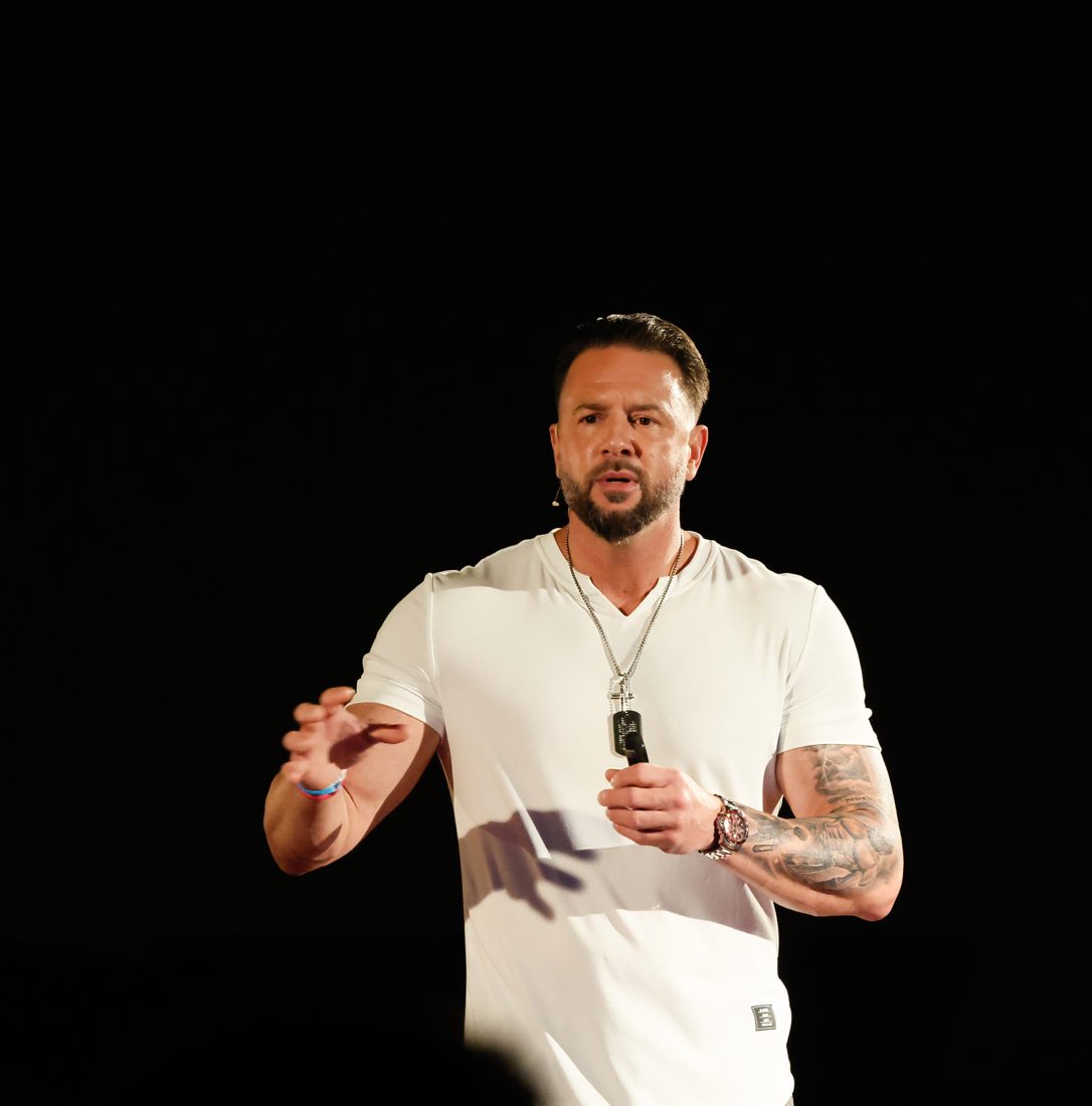 John Kundly speaking on the TEDx stage